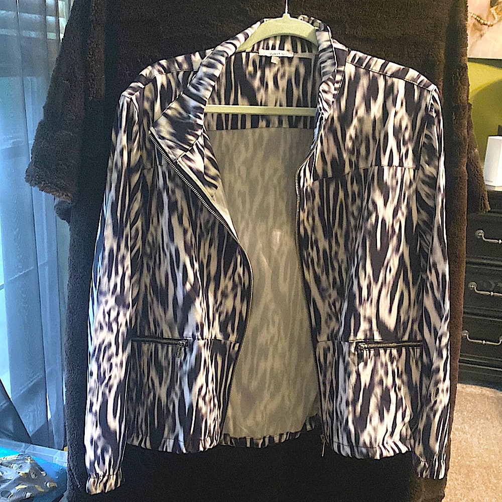 Brand new, never worn XL Calvin Klein Jacket. Purchased at Dillards.
